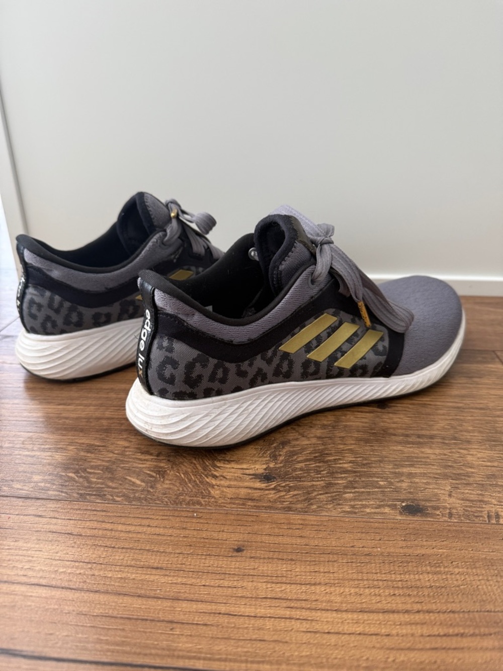 adidas Grey Knit Sneaker with Gold Stripes and Leopard Accent